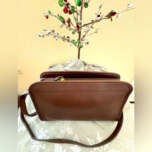 SOLD Coach Sutton Zip in Deep Brown.